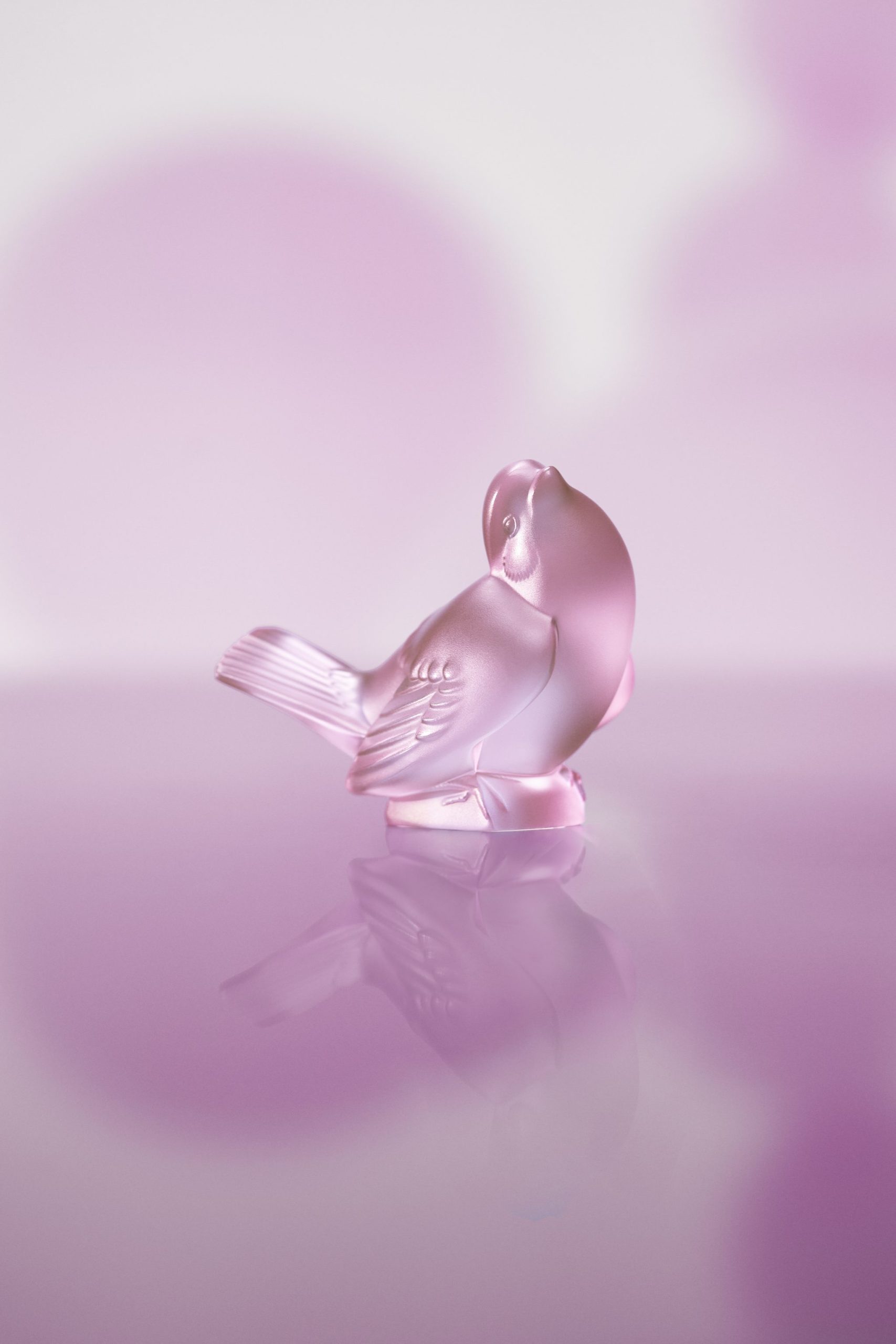 maison lalique iconics rose nebula sparrow sculpture, pink luster â©lalique sa